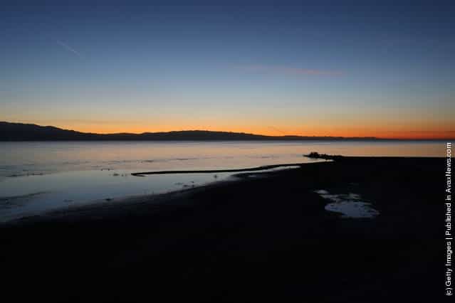 The Salton Sea is seen before dawn in an area where a controversial development would create a new town for nearly 40,000 people on the northwest shore of the biggest lake in California, the Salton Sea