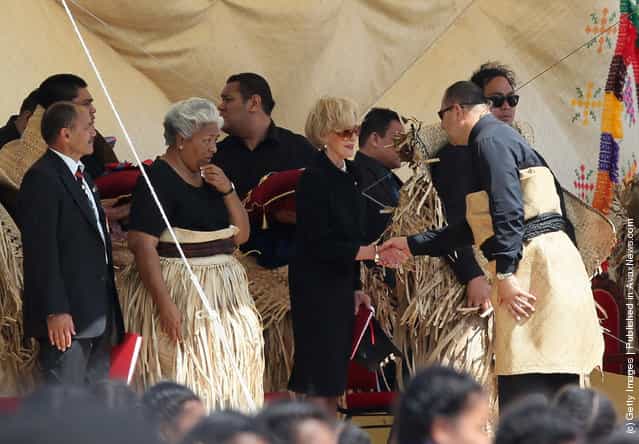 The new King Tupou VI greets the Australian Goveror General Ms Quentin Bryce during the State Funeral held for King George Tupou V at Malaekula