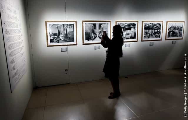 Members of the press view exhibits during a media preview of a new exhibit 'Titanic: 100 Year Obsession', at the National Geographic Museum which highlights the history of the Titanic and its sinking in the year 1912