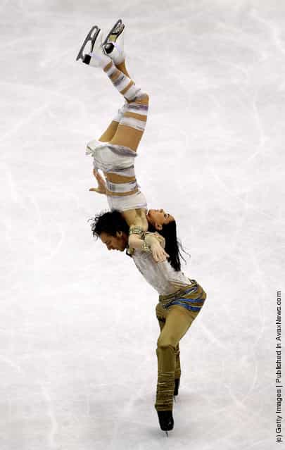 Nathalie Pechalat and Fabian Bourzat of France perform during day four of the ISU World Figure Skating Championships