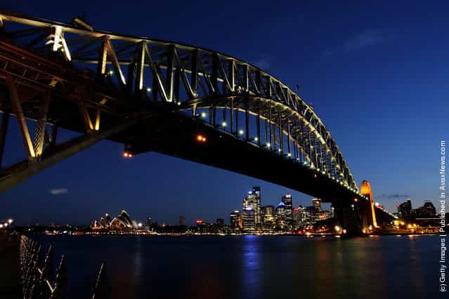 The Sydney Harbour Bridge is seen before the lights are switched off for Earth Hour