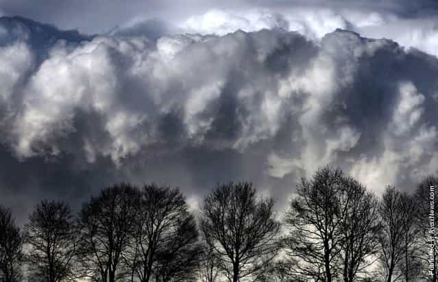 A cloudy sky is pictured above an Allgaeu landscape near Geislatsried, Germany, April 10, 2012