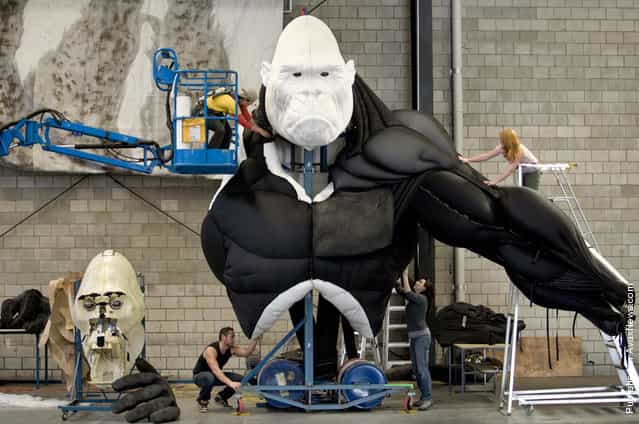 Workers assemble a robotic King Kong creature in preparation for the show [King Kong: Live on Stage] at the Creature Theatre Company workshop in Melbourne, Australia