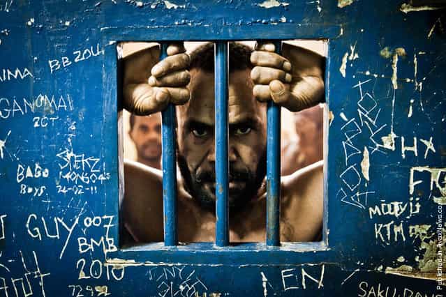 Andres Sime (39), is waiting for the court trial in the prison cell having been accused of multiple rapes. Port Morsby, the Boroko police station