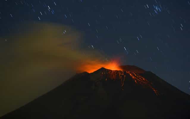 Incandescent materials, ash and smoke are spewed from the Popocatepetl Volcano as seen from Santiago Xalitzintla, in the Mexican central state of Puebla. Residents at the foot of Mexico’s Popocatepetl volcano no longer sleep soundly since the towering mountain roared back into action over a week ago, spewing out a hail of rocks, steam and ashes. The volcano, Mexico’s second highest peak at 5,452 metres, started rumbling and spurting high clouds of ash and steam on April 13, provoking the authorities to raise the alert to level five on a seven-point scale