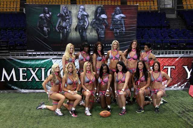 Players from the Western and Eastern Conference of the Lingerie Football League practice and pose ahead of an exhibition match in Mexico City