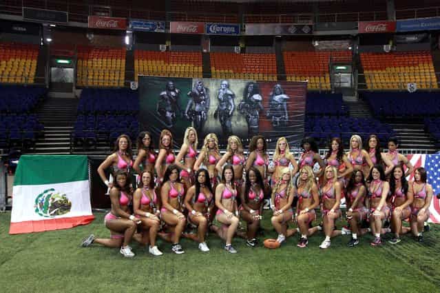 Players from the Western and Eastern Conference of the Lingerie Football League practice and pose ahead of an exhibition match in Mexico City