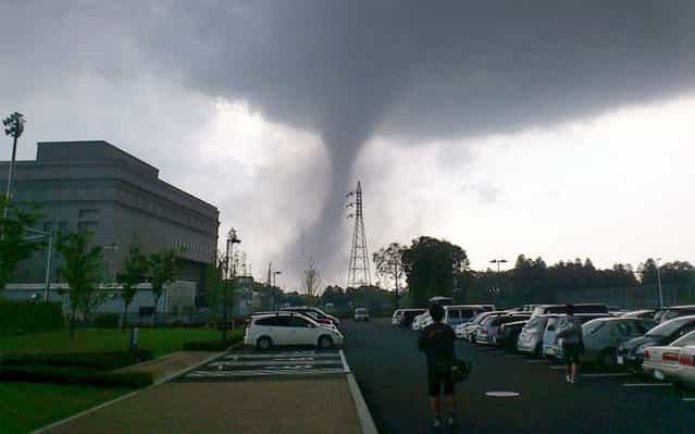 A tornado strikes Tsukuba city, northeast of Tokyo on May 6, 2012. The tornado tore through the area, injuring at least 30 people, destroying dozens of homes and leaving thousands more without electricity