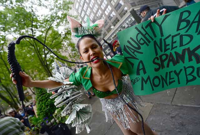Occupy Wall Street partcipants gather to stage a May Day demonstration march at Bryant Park in New York