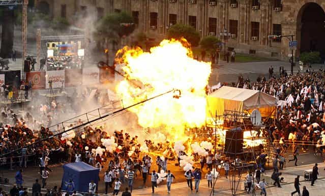 Clusters of balloons exploded Friday during a campaign rally in the central Republic Square in Yerevan, Armenia, injuring at least 144 people, authorities said, on Friday May 4, 2012