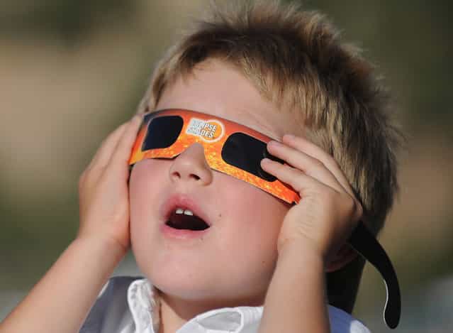 Aaron Peck, 4, watches the annular eclipse in Kanarraville