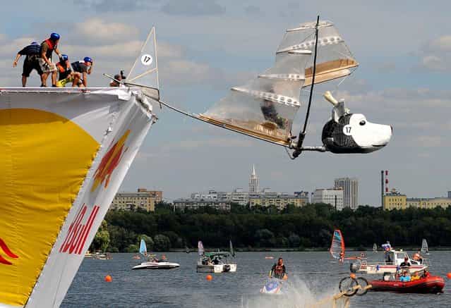 The Belka and Strelka team competes during the Red Bull Flugtag event in Moscow. (Photo by Natalia Kolesnikova/AFP)