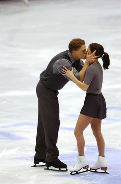 Jamie Sale and David Pelletier of Canada kiss after their routine in the Pairs Free Program Figure Skating at the Salt Lake Ice Center during the Salt Lake City Winter Olympic Games in Salt Lake City, Utah, on 11 Feb 2002. (Photo by Doug Pensinger)