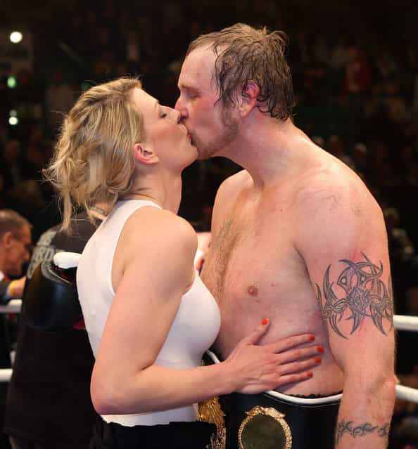 Robert Helenius (R) of Finland and his wife Sandra celebrate after winning the WBO WBA Intercontinental Heavyweight title fight against Samuel Peter of Nigeria at Gerry Weber Stadion on April 2, 2011 in Halle, Germany. (Photo by Boris Streubel)
