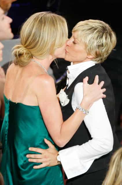 Actress Portia de Rossi (L) kisses TV Host Ellen DeGeneres, after finding out that Ellen DeGeneres won the Outstanding Talk Show/Entertainment award during the 35th Annual Daytime Emmy Awards held at the Kodak Theatre on June 20, 2008 in Hollywood, California. (Photo by Vince Bucci)