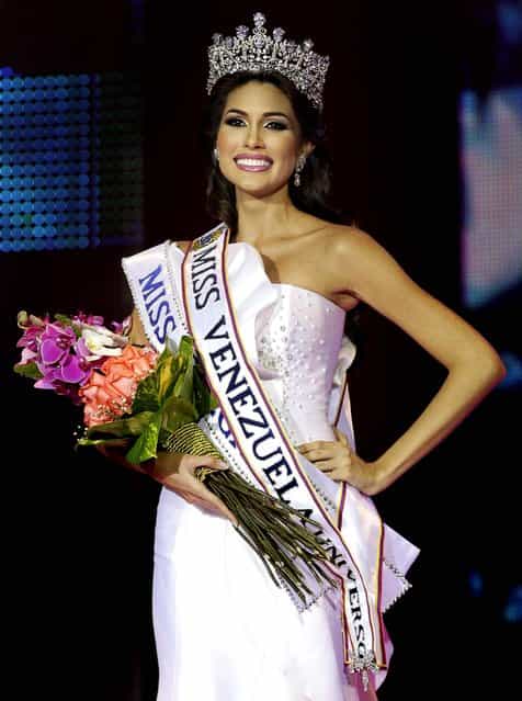 Maria Gabriela Isler smiles after being crowned Miss Venezuela 2012 on August 30, 2012. (Photo by Ariana Cubillos/Associated Press)