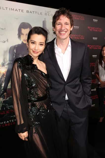 Actress Li Bingbing and writer/director/producer Paul W.S. Anderson arrive at the Los Angeles premiere of [Resident Evil: Retribution] at Regal Cinemas L.A. Live on September 12, 2012 in Los Angeles, California. (Photo by Christopher Polk)