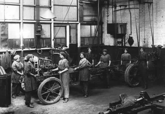 Women war workers working in an engineering shop, 1917. (Photo by Hulton Archive)