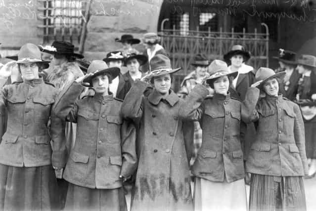 Young women from Lowell in Massachusetts team up to form America's first Women's Death Battalion during World War I, inspired by their Russian counterparts, circa 1917. In front of the armoury where they drill are Mary Tully, Nina Hosington, Blanche Chengnon, Marie Provencher and Agnes Kelley. (Photo by Topical Press Agency/Hulton Archive)