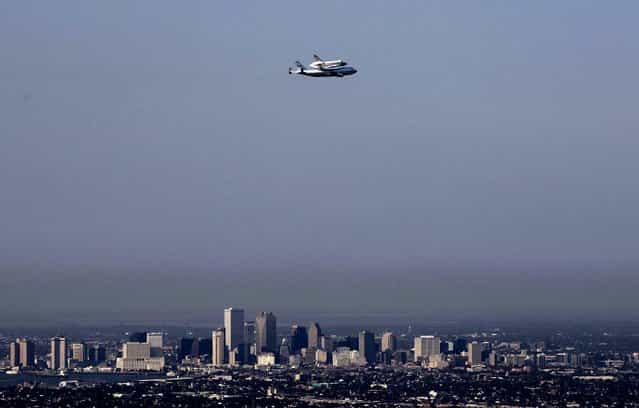 Space shuttle Endeavour flies over New Orleans on Septemer 19, 2012. (Photo by Gerald Herbert/Associated Press)