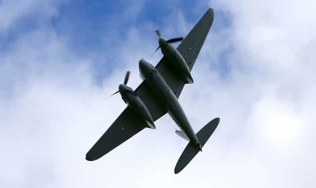 Havilland Mosquito KA 114 performs a low pass during an airshow commemorating the completion of its rebuild on September 29, 2012 in Ardmore, New Zealand. The plane was restored by Warbird Restorations at Ardmore Aerodrome and is the only flying Mosquito in the world. (Photo by Simon Watts)