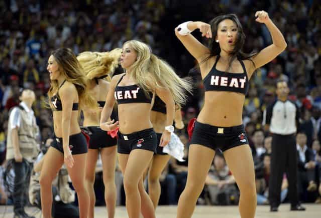 Miami Heat cheerleaders perform during their NBA China Games basketball game against the Los Angeles Clippers in Shanghai on October 14, 2012. (Photo by Mark Ralston/AFP Photo)