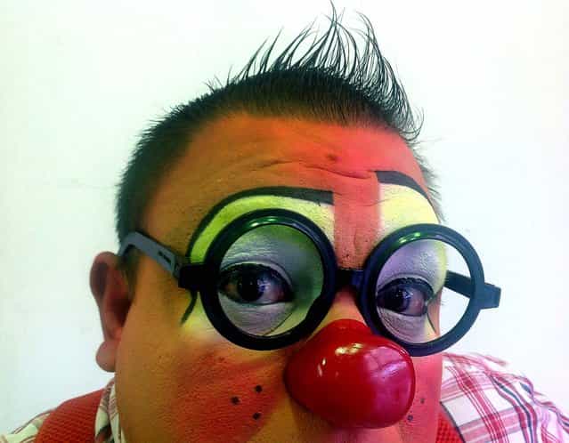 AmPollita, 35, an Auguste clown, poses for a photo during Mexico’s 17th annual clown convention, La Feria de la Risa, in Mexico City. (Photo by Anita Baca/AP Photo)