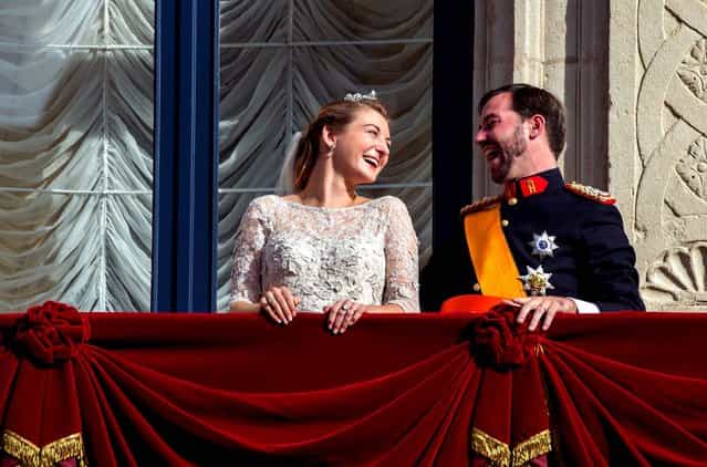 Luxembourg's Prince Guillaume and Countess Stephanie appear on the balcony of the Royal Palace after their wedding in Luxembourg October 20, 2012. (Photo by Geert vanden Wijngaert/Associated Press)