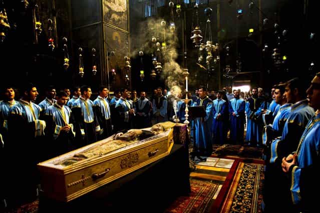 Armenian clergy attend the funeral of the Armenian Patriarch of Jerusalem Torkom Manougian, in the Old City of Jerusalem October 22, 2012. Manougian was 93. (Photo by Bernat Armangue/Associated Press)