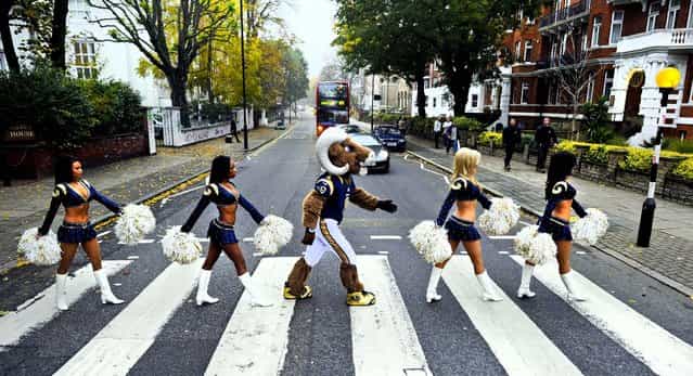 St. Louis Rams cheerleaders and their mascot Rampage pose for photographs on the Abbey Road zebra crossing made famous by the Beatles in London October 24, 2012. The Rams will play the New England Patriots at Wembley Stadium on Sunday, October28, in a regular season NFL game. (Photo by Dave Shopland/NFL)