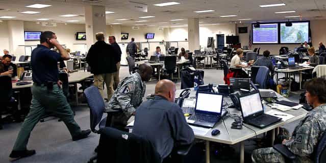 Multiple agencies work in preparation for Hurricane Sandy at the Virginia Emergency Operations Center in Chesterfield County. (Photo by Mark Gormus/Richmond Times-Dispatch)