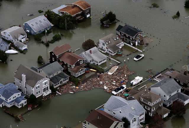 Homes in Seaside, N.J. are flooded in the aftermath of superstorm Sandy. (Photo by Tim Larsen/New Jersey Governor's Office)