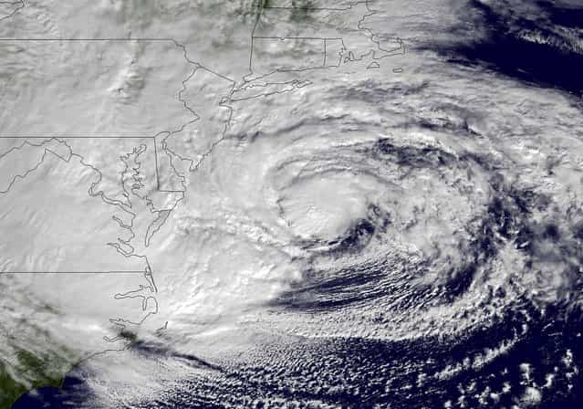 An NOAA satellite image taken Monday shows Hurricane Sandy off the mid-Atlantic coastline moving toward the north with maximum sustained winds of 90 mph. (Photo by NOAA)