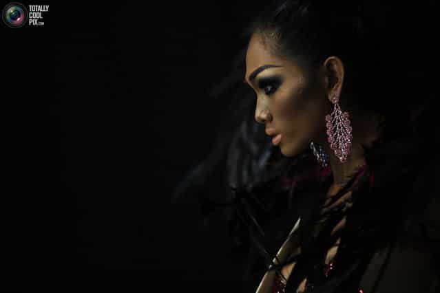 Jimenez, a contestant from Philippines, prepares to go onto stage during Miss International Queen 2012 transgender/transsexual beauty pageant in Pattaya. (Photo by Damir Sagolj/Reuters)
