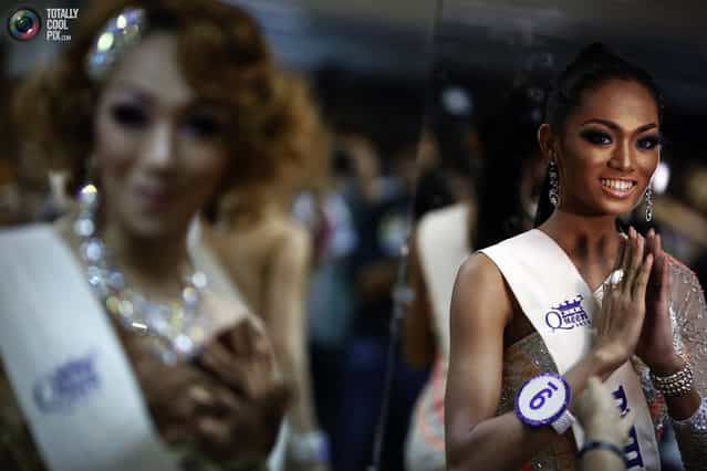 Contestants prepare to go onto stage during Miss International Queen 2012 transgender/transsexual beauty pageant in Pattaya. (Photo by Damir Sagolj/Reuters)