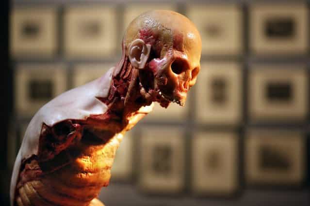 An artwork entitled 'Are you still mad at me ?' by John Isaacs is displayed at the Death: A Self-portrait exhibition at the Wellcome Collection on November 14, 2012 in London, England. The exhibition showcases 300 works from a unique collection by Richard Harris, a former antique print dealer from Chicago, devoted to the iconography of death. The display highlights art works, historical artifacts, anatomical illustrations and ephemera from around the world and opens on November 15, 2012 until February 24, 2013. (Photo by Peter Macdiarmid)