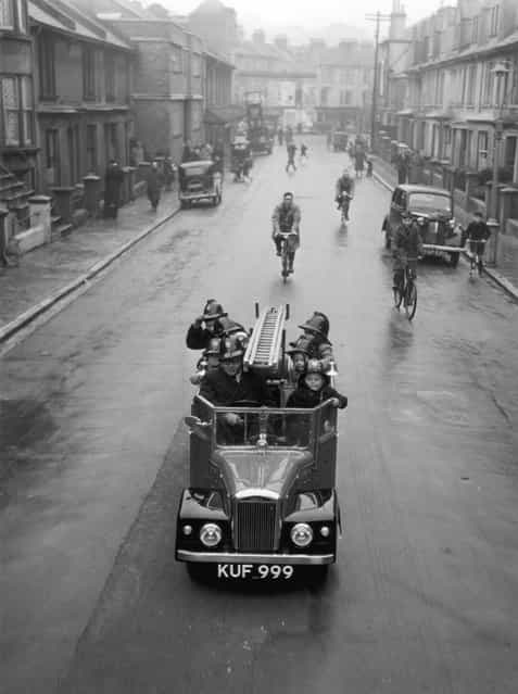 On the streets of Brighton in Sussex, a fire engine, complete with a crew of children, just half the size of a real fire engine, and complete in every detail, with bells, ladders and hoses. 5th May 1951. (Photo by Chris Ware/Keystone Features)