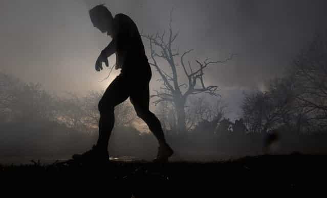 A competitor in action during the Tough Guy Challenge on January 27, 2013 in Telford, England. (Photo by Ian Walton)