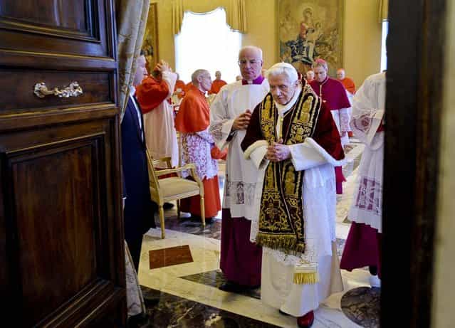 Pope Benedict XVI leaves after attending a meeting of Vatican cardinals where he read a document in Latin in which he announced his resignation, February 11, 2012. The Pope announced that he would resign February 28 – the first pontiff to do so in nearly 600 years. (Photo by L'Osservatore Romano)