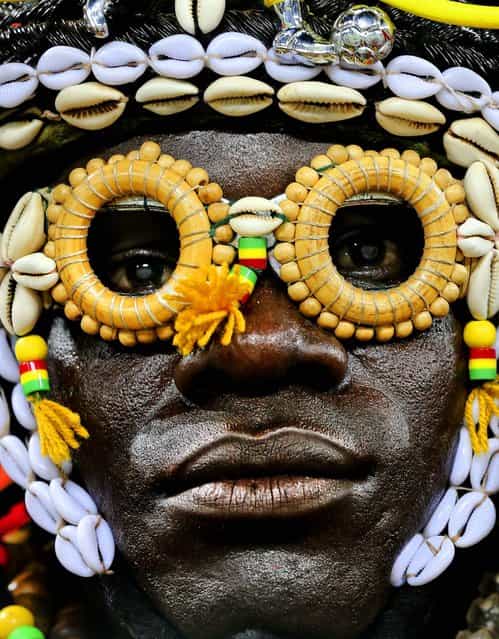 A Burkina Faso soccer fan waits for the start of the African Cup of Nations semi-final soccer match at Mbombela Stadium against Ghana in Nelspruit, South Africa, on February 6, 2013. (Photo by Themba Hadebe/Associated Press)