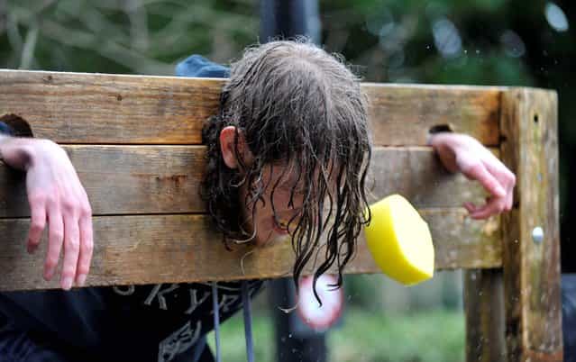 Irish Examiner News Picture 12-02-2013. Conor O'Donoghue getting hit by a wet sponge during Rag week at UCC. Picture Dan Linehan