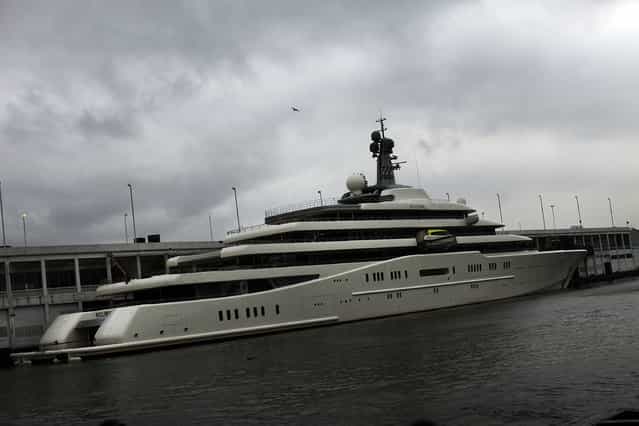 The Eclipse, reported to be the largest private yacht in the world, is viewed docked at a pier in New York on February 19, 2013 in New York City. The boat, which measures 557ft in length and is estimated to cost 1.5 billion US dollars, is owned by Russian billionaire Roman Abramovich and arrived into New York on Wednesday. (Photo by Spencer Platt)