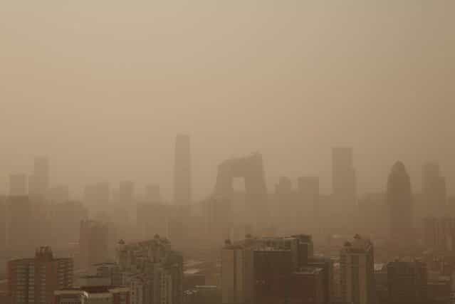 A general view of the skyscrapers in the sandstorm on February 28, 2013 in Beijing, China. Beijing was hit by its first sandstorm of the year while its air quality reached dangerous level on Thursday. (Photo by Feng Li)