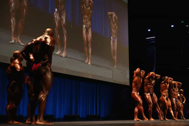 Competitors stand on stage during the IFBB Australia Pro Grand Prix at The Plenary on March 9, 2013 in Melbourne, Australia. (Photo by Robert Cianflone)