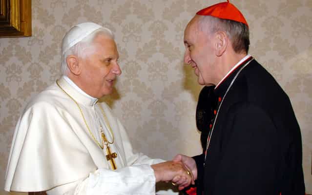 January 13, 2007 file photo provided by the Vatican newspaper L'Osservatore Romano, then Pope Benedict XVI, left, shakes hands with the archbishop of Buenos Aires Cardinal Jorge Mario Bergoglio during their meeting at the Vatican, Saturday, January 13, 2007. Bergoglio, who took the name of Pope Francis, was elected on Wednesday, March 13, 2013 the 266th pontiff of the Roman Catholic Church. (Photo by L'Osservatore Romano/AP Photo)