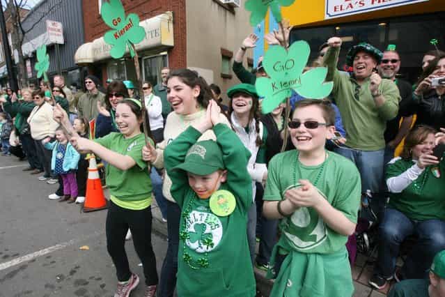 The crowd cheering for the Ridgewood School of Irish Dancing during the 32nd Bergen County St. Patrick's Day Parade, Sunday, March 10, 2013 in Bergenfield, N.J. (Photo by Chris Pedota/AP Photo/The Record)