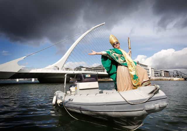 St. Patrick Makes A Splash For The 2013 Festival. Navigating a course this morning up Dublin's River Liffey, St. Patrick himself has arrived safely in Dublin City Centre, in time for this year's fun filled, five day St. Patrick Festival. (Photo by Robbie Reynolds)