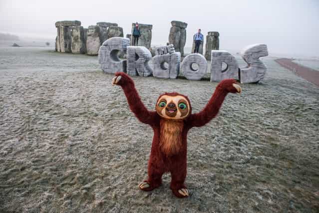 19th March 2013: In celebration of the Spring Solstice 2013 and in conjunction with the release of Twentieth Century Fox's 3D animation ‘THE CROODS’ - a family animation centered around the first ever pre historic road trip - a giant monument was erected at Stonehenge at sunrise today, Tuesday 19th March. This marks the first time a modern structure has EVER been allowed on this historic site. The Spring Solstice or ‘Vernal Equinox’ recognises the first day of spring and each year sees druids and pagans gather at Stonehenge early in the morning to watch the sun rise above the prehistoric stones. This year an additional monument, in the shape of ‘THE CROODS’, will become part of these special celebrations at daybreak. ‘Meet the first modern family, THE CROODS, whose world is rocked by generational clashes and seismic shifts that come to a head on a wild road trip filled with dazzling adventures, amazing firsts (like fire…and shoes), never before seen creatures and the epic discovery that they’ll have to stay one step ahead of the ever-changing world or get left in the prehistoric dust.’ DreamWorks Animation SKG presents THE CROODS. The film is directed by Chris Sanders & Kirk DeMicco, and produced by Kristine Belson and Jane Hartwell. The screenplay is by Kirk DeMicco & Chris Sanders, with a story by John Cleese, Kirk DeMicco and Chris Sanders. The music is by Alan Silvestri. The film stars Nicolas Cage as Grug, Ryan Reynolds as Guy, Emma Stone as Eep, Catherine Keener as Ugga, Clark Duke as Thunk, and Cloris Leachman as Gran. THE CROODS presents an age known as the Croodaceous Period, which, says DeMicco, [fell between the Jurassic Age and the ‘Katzenzoic Era’– at least according to DreamWorks archaeologists.] It is a world of visual splendor and grandeur that holds innumerable challenges for the beleaguered clan