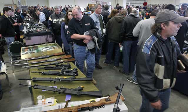 The Washington County Fairgrounds Gun Show drew thousands of people over the weekend, on March 22, 2013. (Photo by Gary Porter)