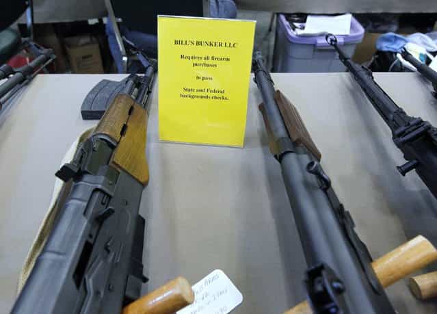 Most of the sellers at the Washington County Fairgrounds Gun Show are licensed dealers and require background checks before selling a firearm, on March 22, 2013. (Photo by Gary Porter)